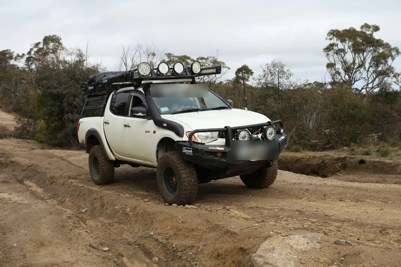 Steel front bullbar with spotlights on an off-road 4x4
