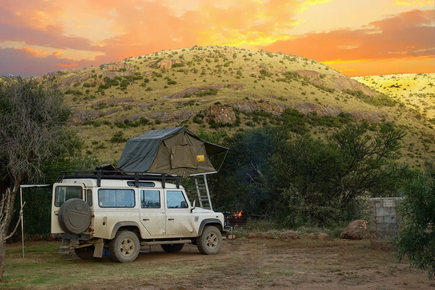 Expedition roof rack and rooftop tent on a safari 4x4